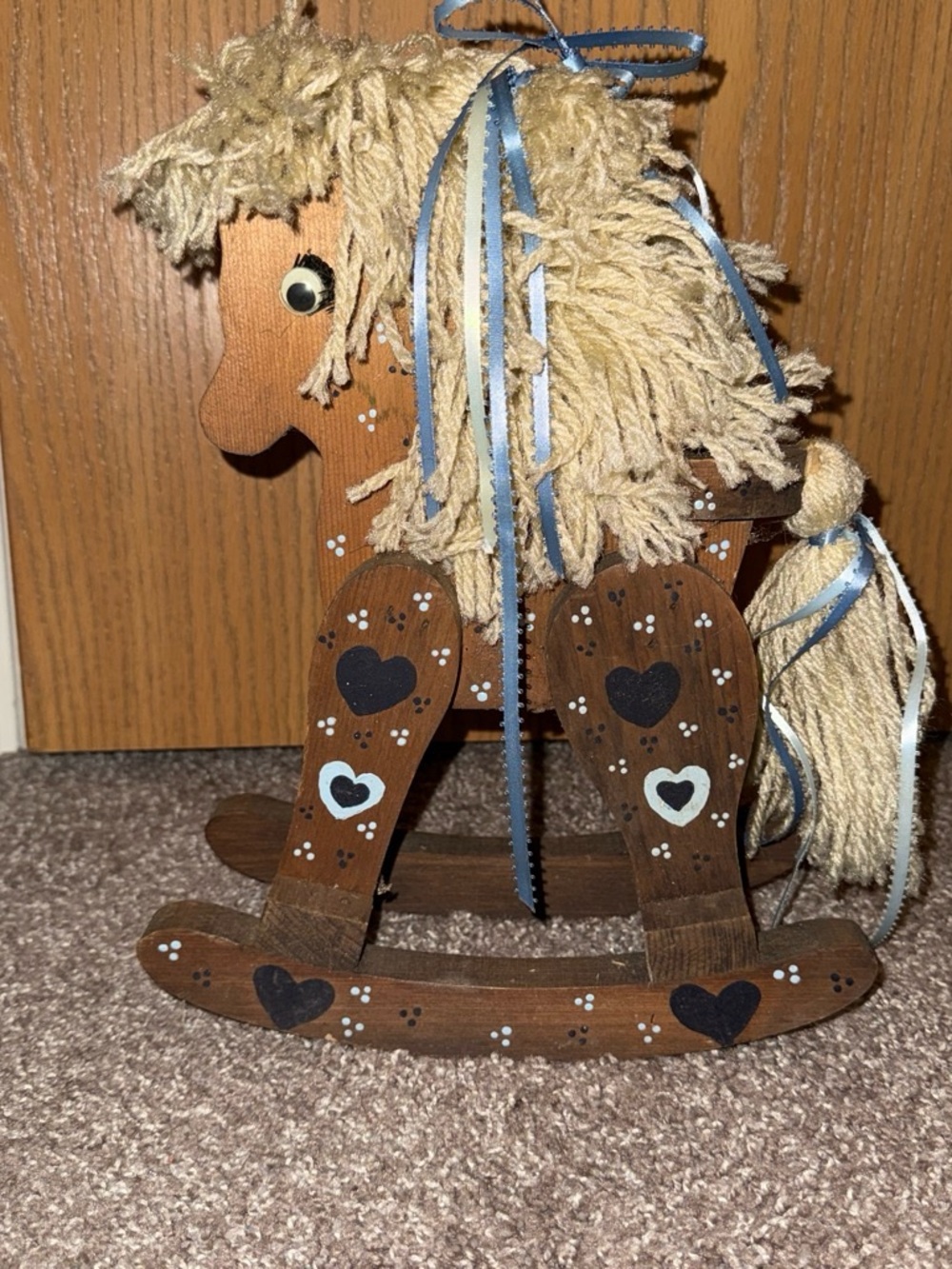 Rustic Brown Wooden Rocking Horse with Cream Yarn Mane